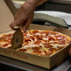 Illustration for article titled Pizzeria manager drives 225 miles to deliver pizza to terminally ill man em/em